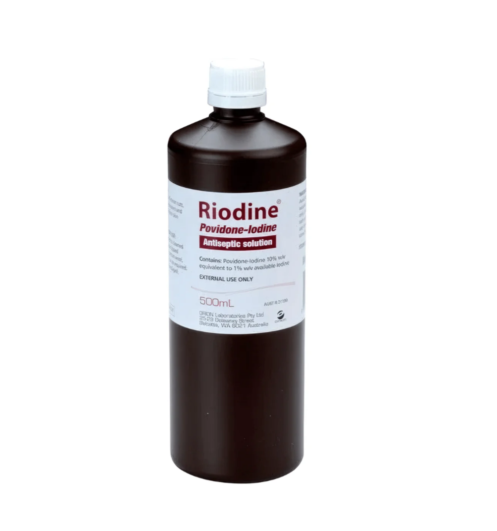 Bottle of Riodine Povidone-Iodine Antiseptic Solution on a white background