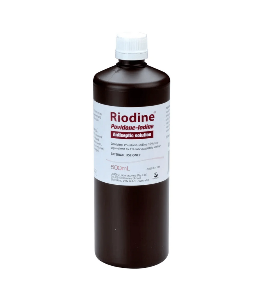 Bottle of Riodine Povidone-Iodine Antiseptic Solution on a white background